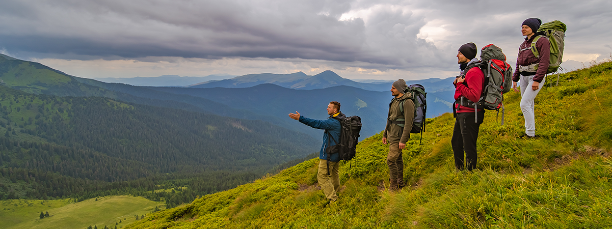 A small business owner sharing a genuine moment with a guest who is clearly the right fit for what the business offers